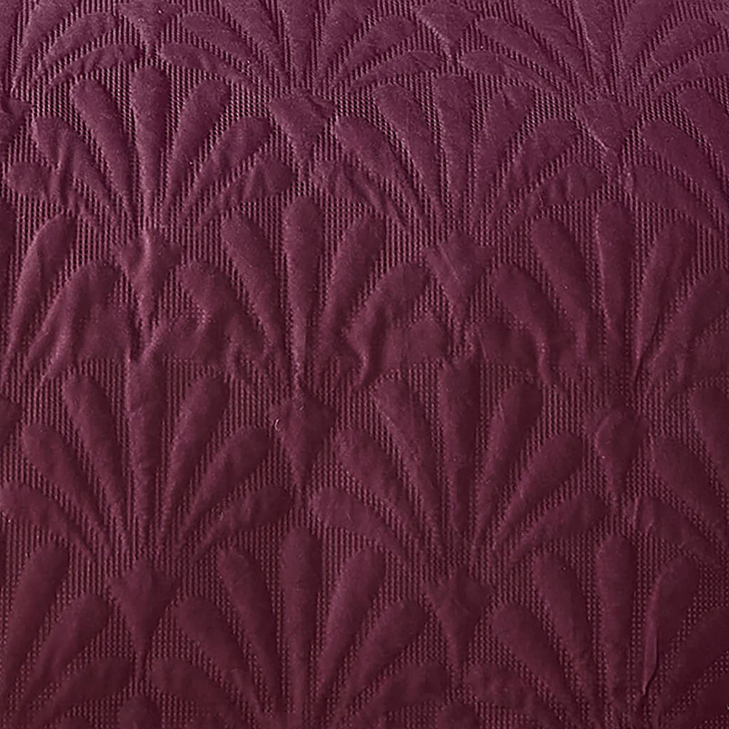 Close-up of the Pinsonic textured quilted pattern on the Serene Cavali bedspread.