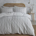 Serene Crinkle Stripe textured duvet cover set in white with geometric stripe detailing.