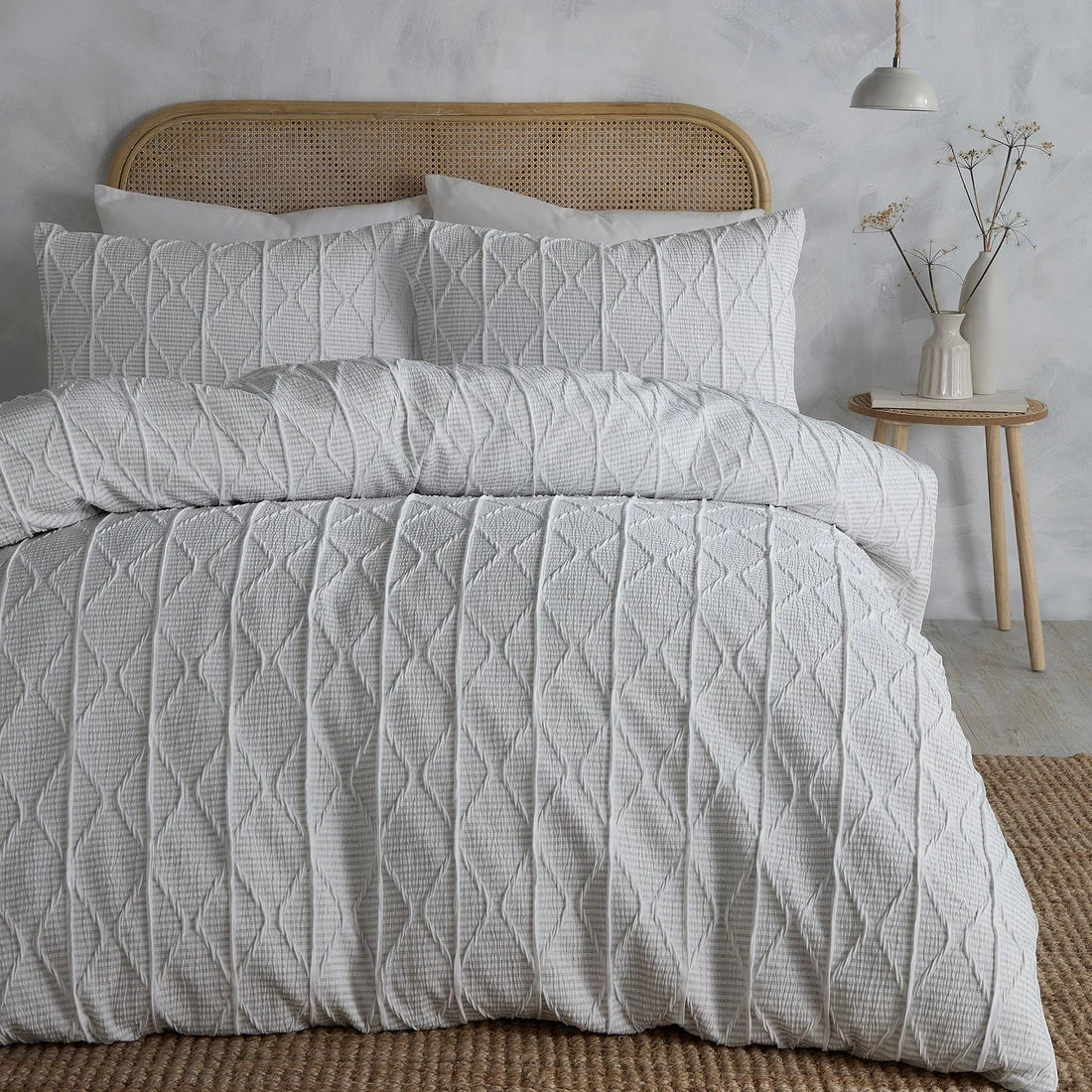 Serene Crinkle Stripe textured duvet cover set in white with geometric stripe detailing.