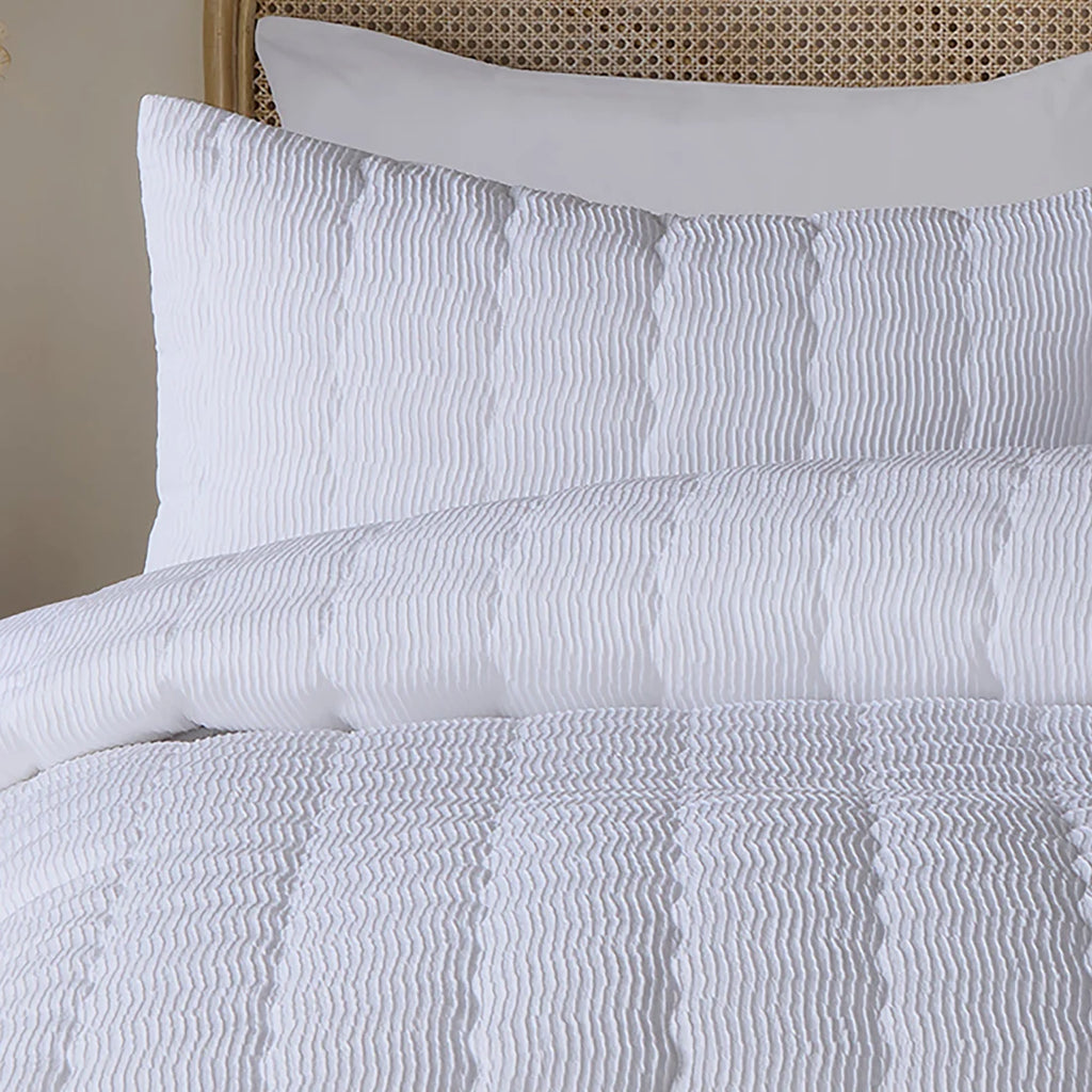 Close-up of the crinkle wave textured finish on the Serene duvet cover set.