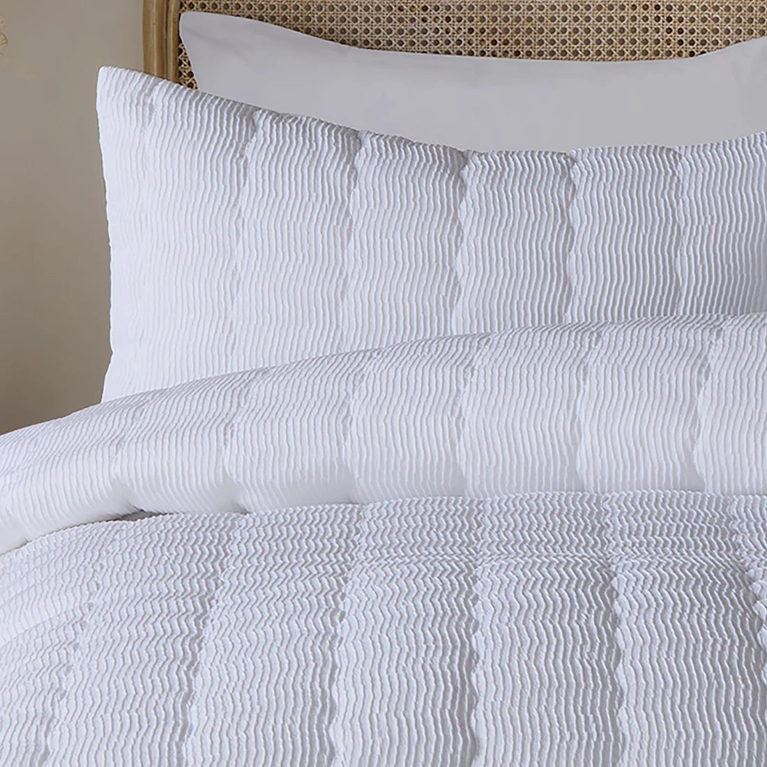 Close-up of the crinkle wave textured finish on the Serene duvet cover set.