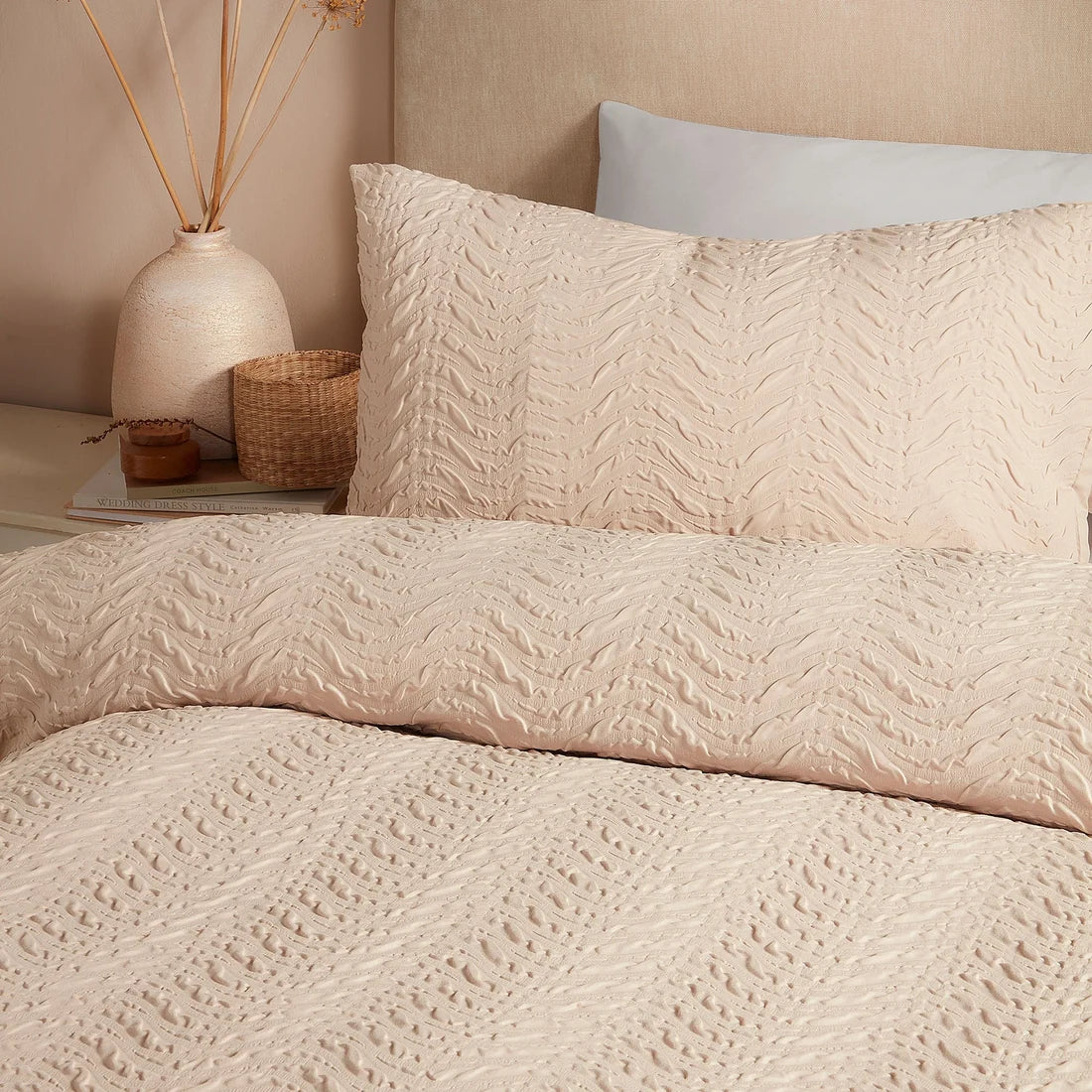 Close-up of the embossed curved wave texture on the Serene Embossed Curve duvet cover set.