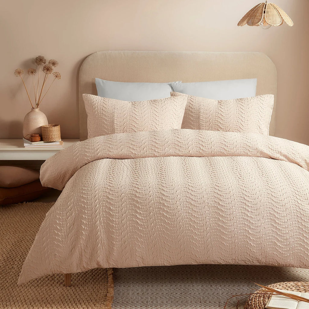 Serene Embossed Curve textured duvet cover set in natural with an embossed wave design.
