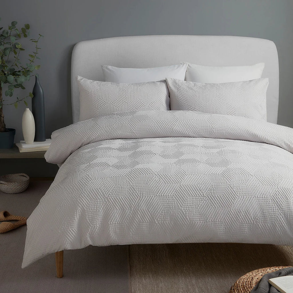 Serene Embossed Geo textured duvet cover set in grey with an embossed geometric pattern.