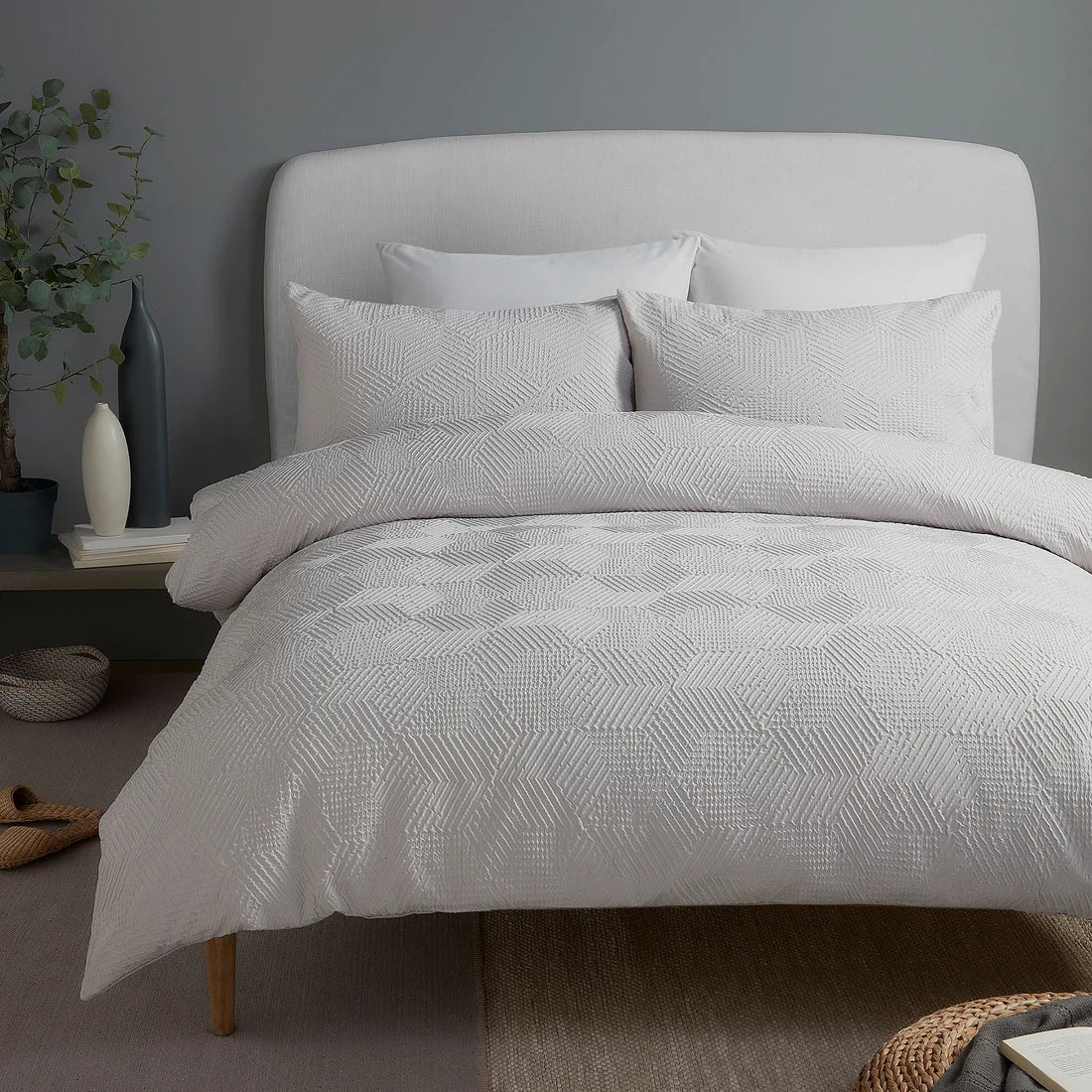 Serene Embossed Geo textured duvet cover set in grey with an embossed geometric pattern.