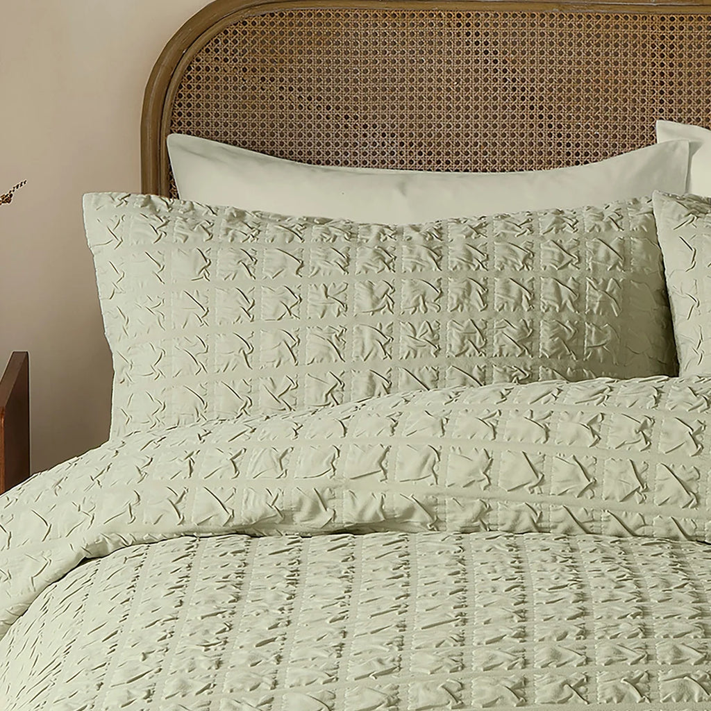 Close-up of the embossed grid texture on the Serene Embossed Grid duvet cover set.