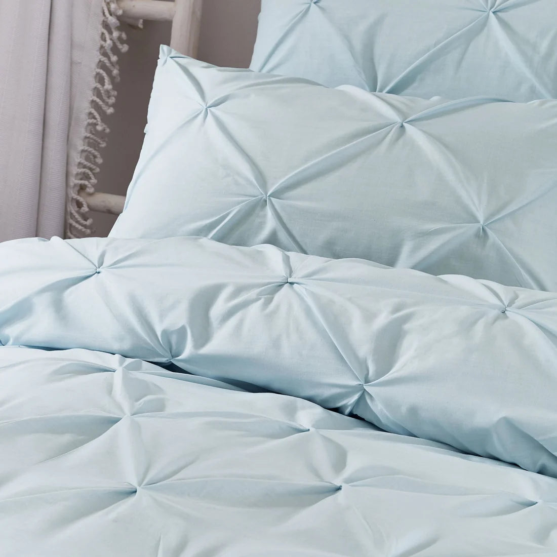 Close-up of the ruched textured design on the Serene Lara duvet cover set.