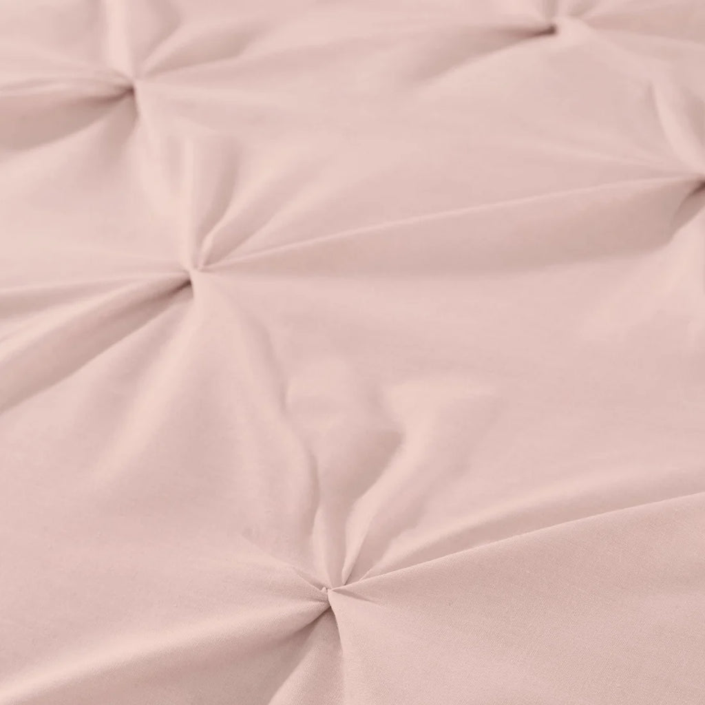 Close-up of the soft 100% microfibre fabric on the Serene Lara blush duvet cover set.