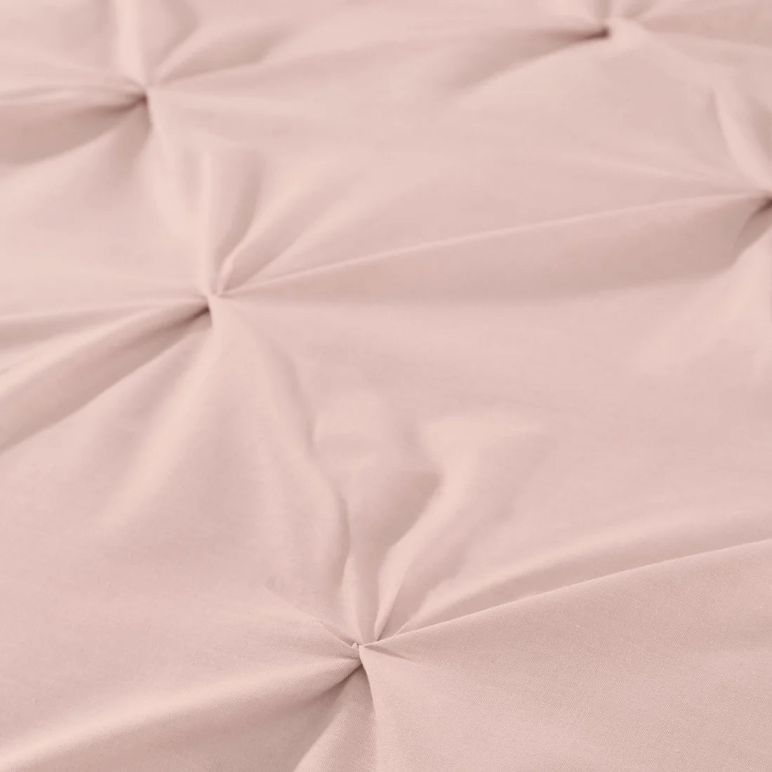 Close-up of the soft 100% microfibre fabric on the Serene Lara blush duvet cover set.