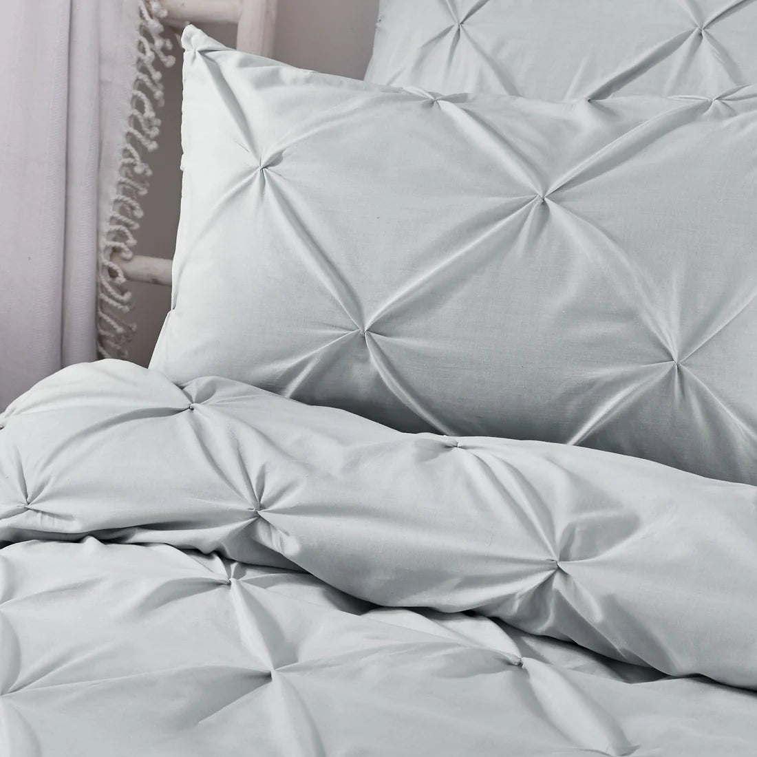 Close-up of the ruched textured design on the Serene Lara duvet cover set.