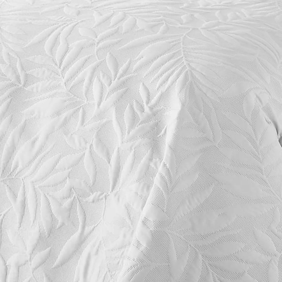 Close-up of the soft polyester microfibre fabric on the Serene Luana white bedspread.