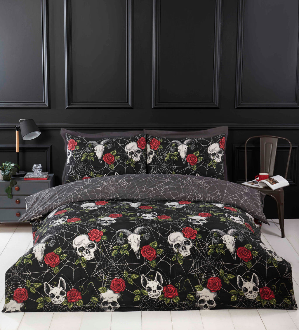 Skulls & Roses reversible gothic microfibre duvet cover set with skulls, roses and spider web design.