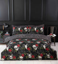 Skulls & Roses reversible gothic microfibre duvet cover set with skulls, roses and spider web design.