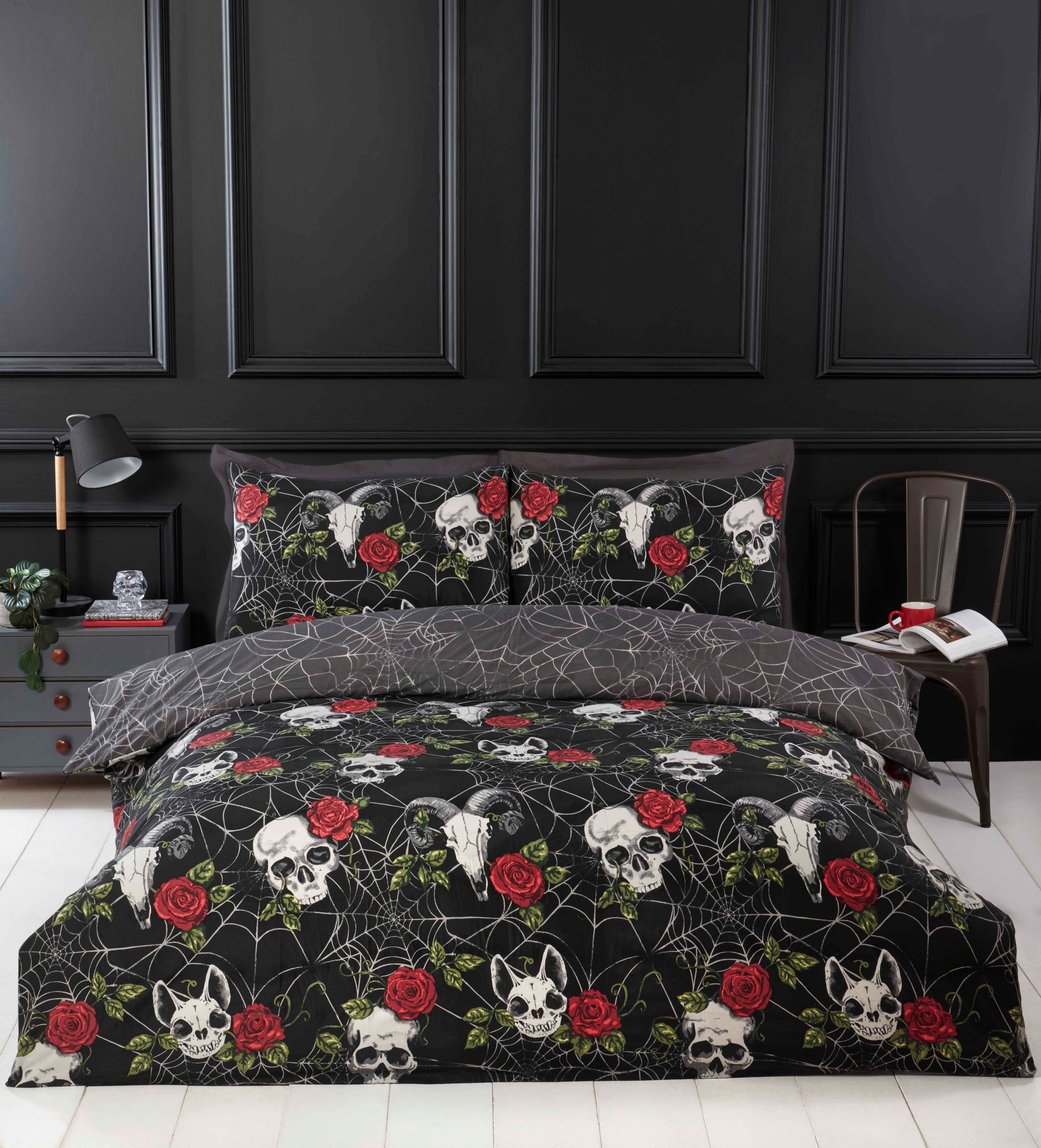 Skulls & Roses reversible gothic microfibre duvet cover set with skulls, roses and spider web design.