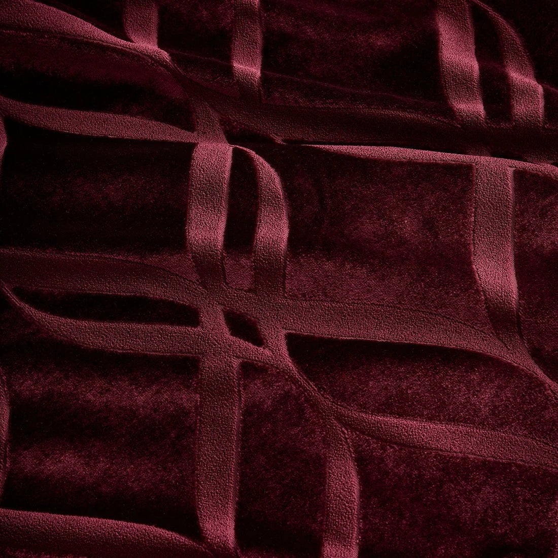 Close-up of the soft velvet-feel polyester fabric on the Soiree Belfort duvet cover set.