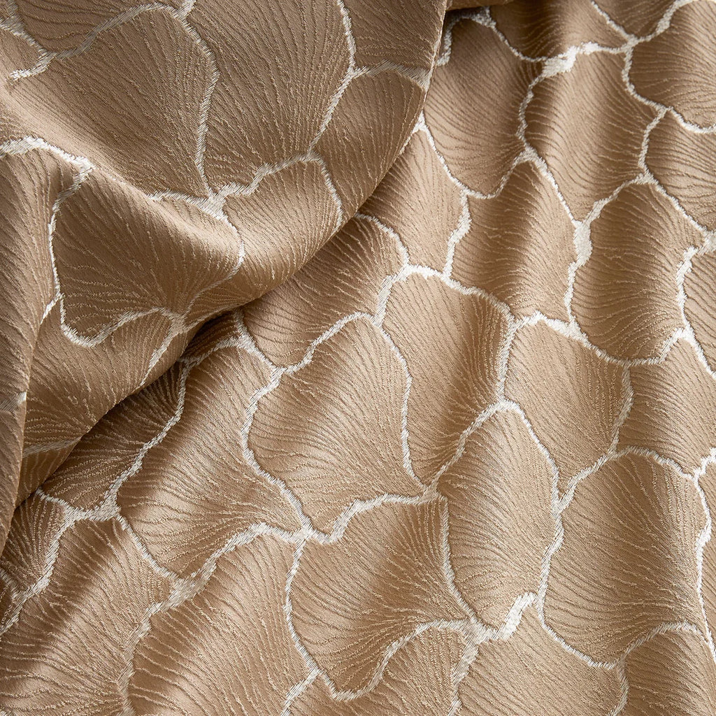 Close-up of the soft jacquard polyester fabric on the Soiree Ginkgo duvet cover set.