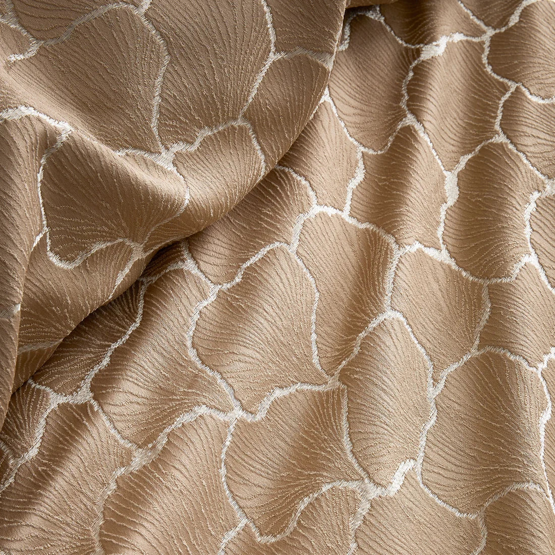 Close-up of the soft jacquard polyester fabric on the Soiree Ginkgo duvet cover set.