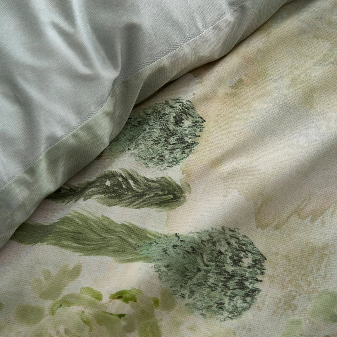 Close-up of the soft 200 thread count 100% cotton fabric on the Soiree Hidden Garden duvet cover set.