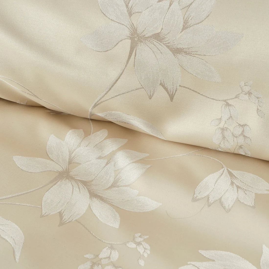 Close-up of the soft jacquard polyester fabric on the Soiree Lilly Floral duvet cover set.
