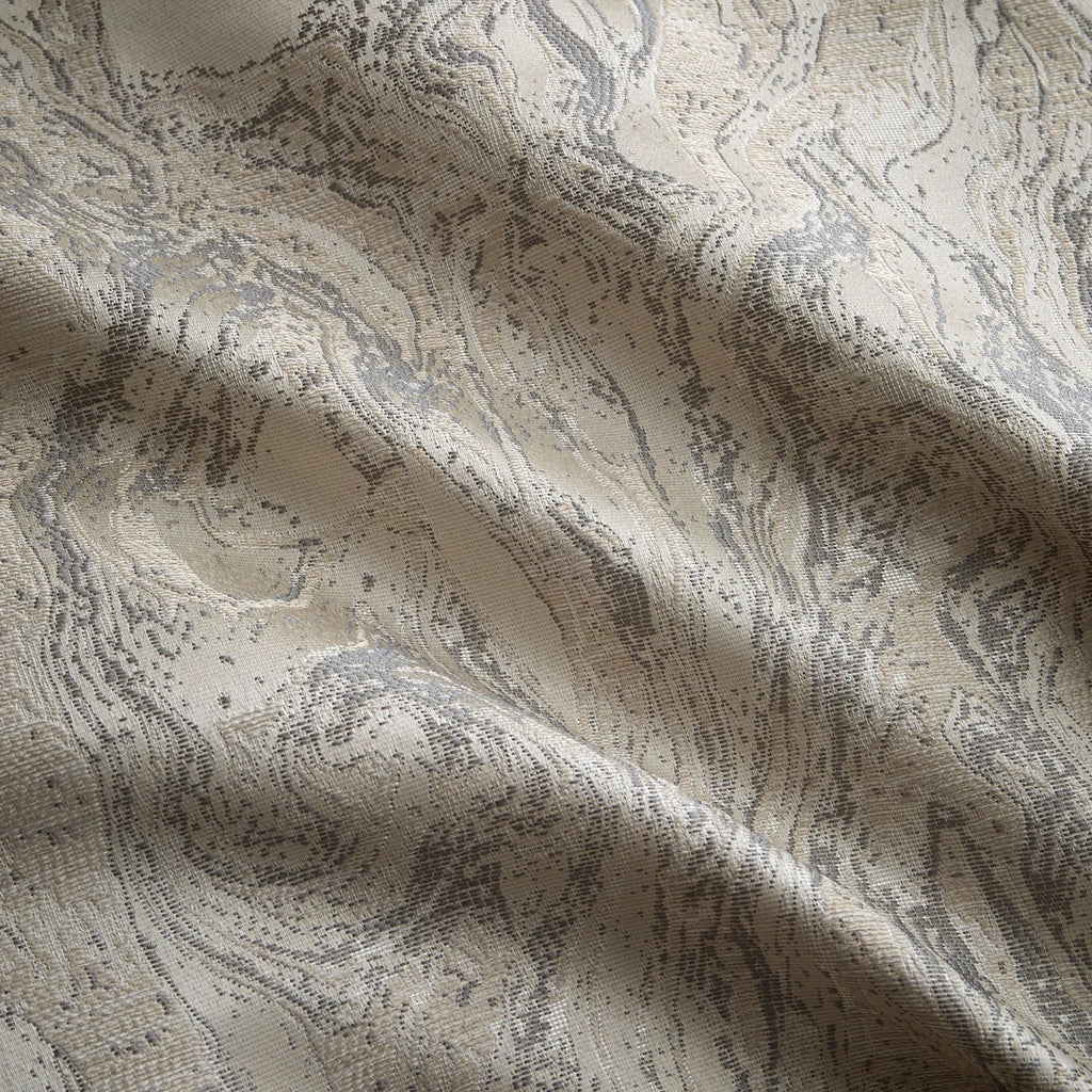 Close-up of the soft jacquard polyester fabric on the Soiree Marble duvet cover set.