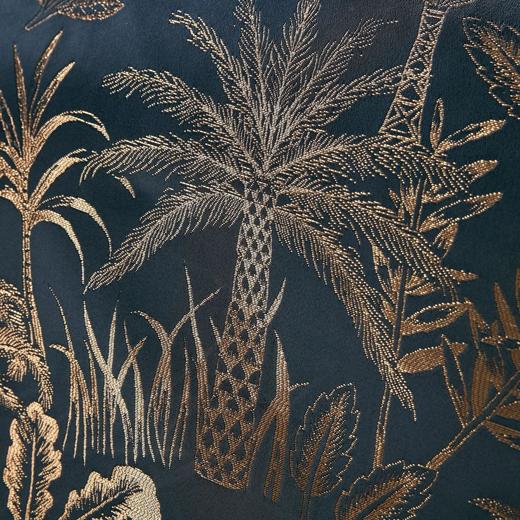 Close-up of the soft polyester jacquard fabric on the Soiree Midnight Palm duvet cover set.