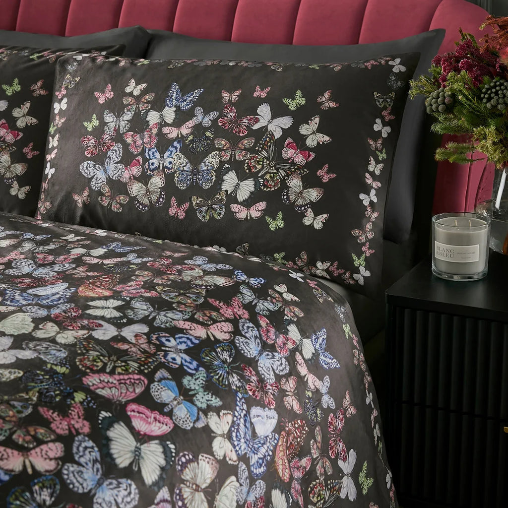 Close-up of the colourful butterfly panel design on the Soiree Papillon duvet cover set.