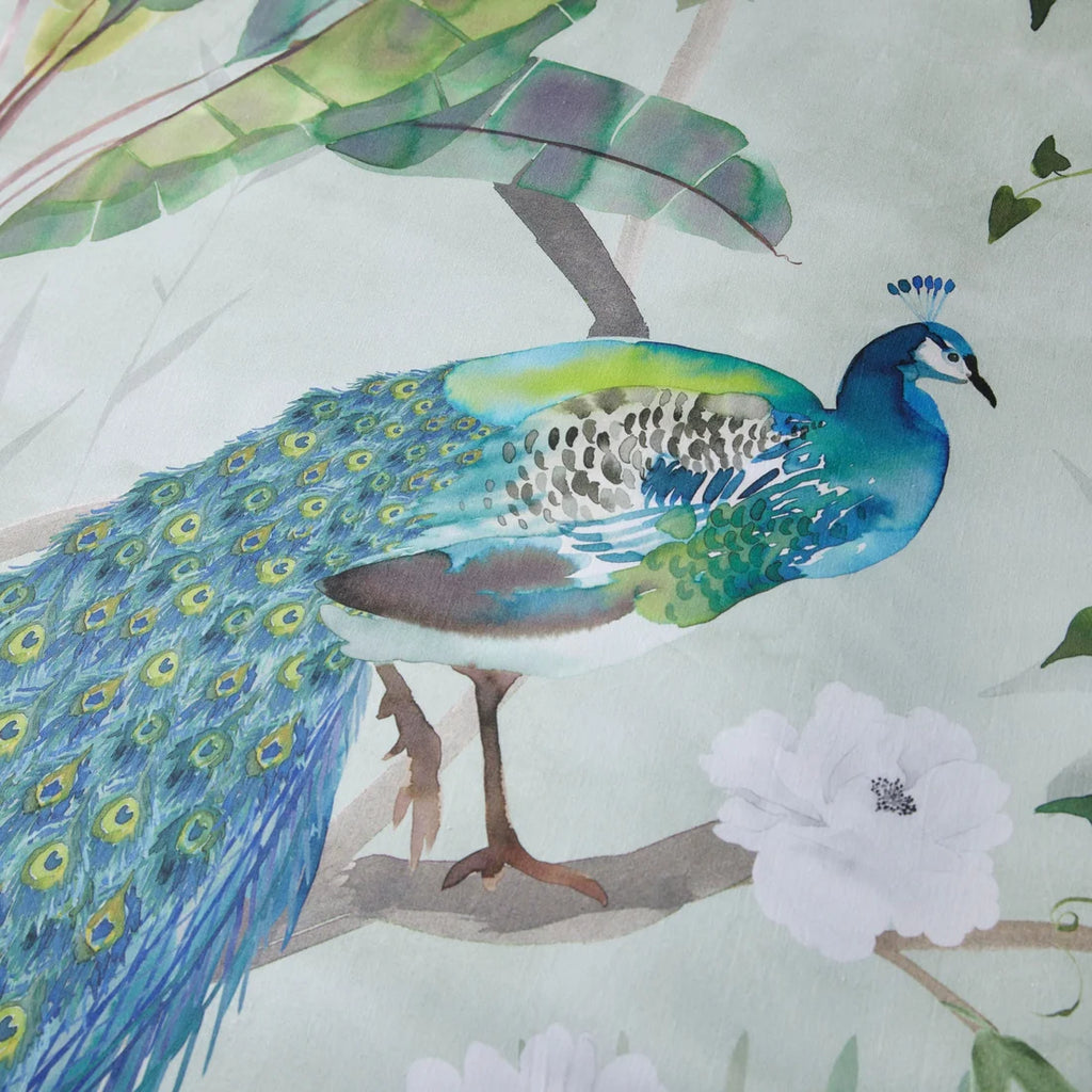 Close-up of the smooth 200 thread count cotton-rich fabric on the Soiree Peacock Jungle duvet cover set.