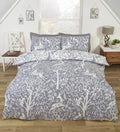 Tatton grey woodland duvet cover set styled in a cosy Scandinavian bedroom.