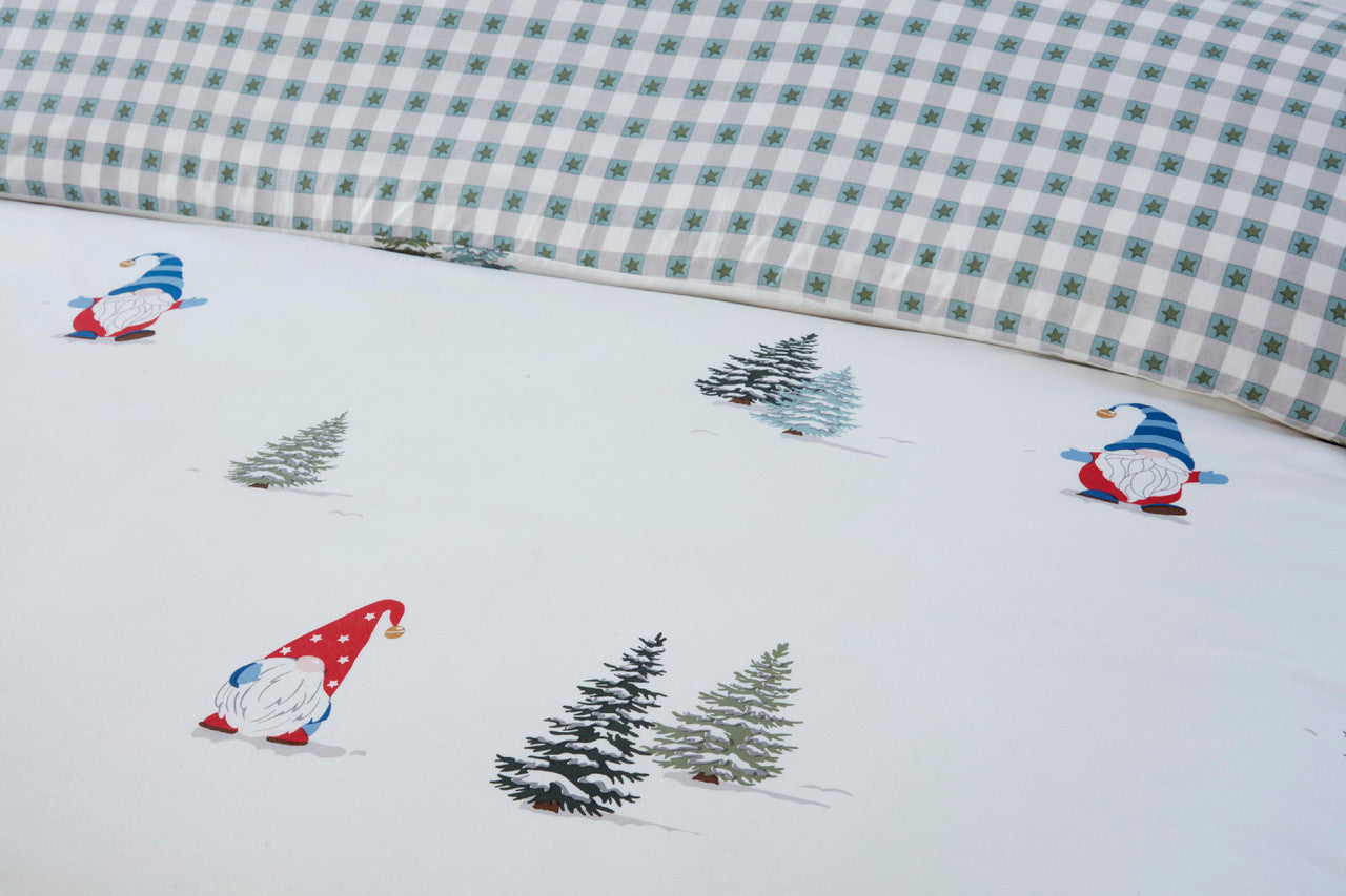 Close-up of the festive gonk and Christmas tree design on the Winter Gonks duvet cover set.