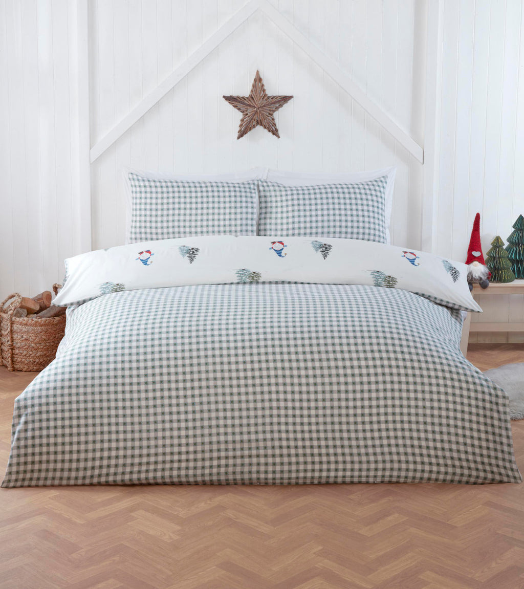 Close-up of the festive gonk and Christmas tree design on the Winter Gonks duvet cover set.