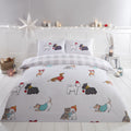 Winter Tails Christmas dog duvet cover set styled in a cosy festive bedroom.