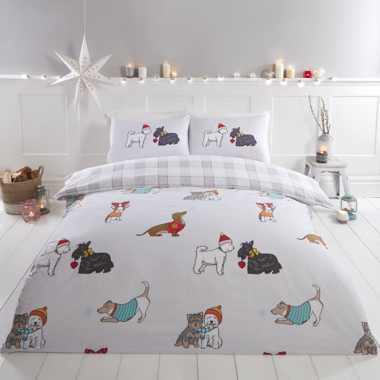 Winter Tails Christmas dog duvet cover set styled in a cosy festive bedroom.